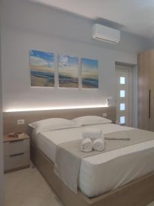 Postel nebo postele na pokoji v ubytování BP Beach Apartments