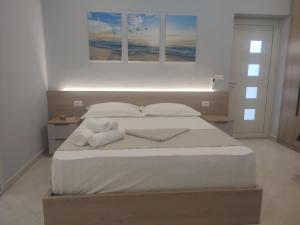 Postel nebo postele na pokoji v ubytování BP Beach Apartments