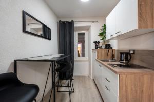 Kuchyňa alebo kuchynka v ubytovaní Apartments Villa Sol