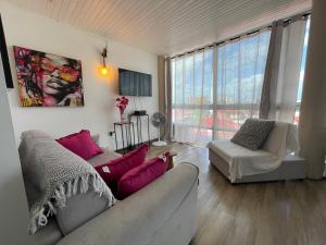 Posezení v ubytování PENTHOUSE 10 MIN port croisière et aéroport