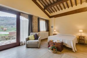 Postel nebo postele na pokoji v ubytování Agriturismo Le Canterie + 37 fotografií