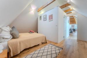 Łóżko lub łóżka w pokoju w obiekcie Loft Dachsberg