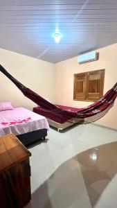 Postel nebo postele na pokoji v ubytování Casa em Alter do Chão