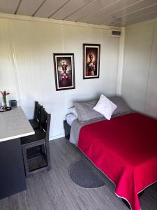 Ένα ή περισσότερα κρεβάτια σε δωμάτιο στο Dadirri Cozy House Santa Elena Monteverde +51 φωτογραφίες