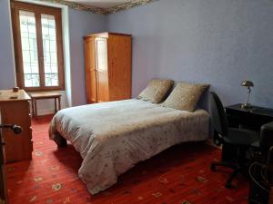 Ένα ή περισσότερα κρεβάτια σε δωμάτιο στο Gîte Ouillypontain