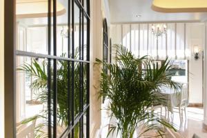Ένα ή περισσότερα κρεβάτια σε δωμάτιο στο Hospedium Hotel Castilla +86 φωτογραφίες