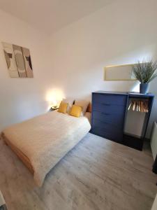 Ένα ή περισσότερα κρεβάτια σε δωμάτιο στο Appartement palace Bernascon +10 φωτογραφίες