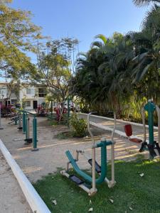 a row of exercise equipment in a park at Casa Residencial la Primavera in Puerto Vallarta