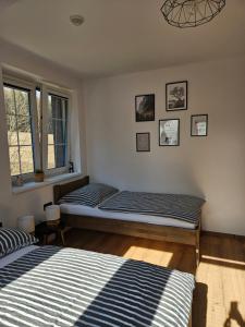 Postel nebo postele na pokoji v ubytování Horský apartmán MIKI