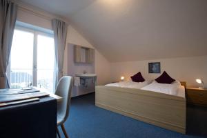 Postel nebo postele na pokoji v ubytování Strengen Guesthouse