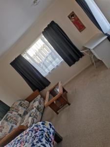 Posezení v ubytování Half Moon Bay Ensuite room