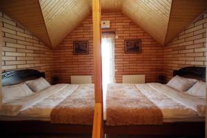 Postel nebo postele na pokoji v ubytování harmony