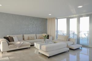 Posezení v ubytování Luxusný Penthouse nad jazerami 230 m2, 2x garáž, WIFI