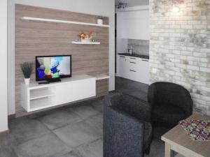Televízia a/alebo spoločenská miestnosť v ubytovaní Apartment in Miedzyzdroje near Sea Beach