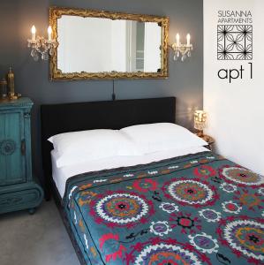 Posteľ alebo postele v izbe v ubytovaní Susanna Apartments - Your Oasis in Athens Ano Petralona