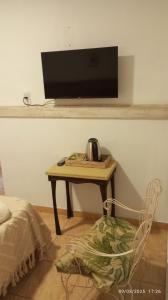 TV a/nebo společenská místnost v ubytování Ára apart