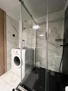 Ένα μπάνιο στο 3C Apartment A Cozy Apartment in the Heart of Alexandroupoli