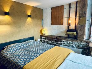 Postel nebo postele na pokoji v ubytování O'pOzArt Guesthouse