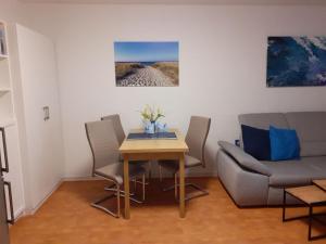Posezení v ubytování Aquamarin - charmantes Appartement mit Balkon