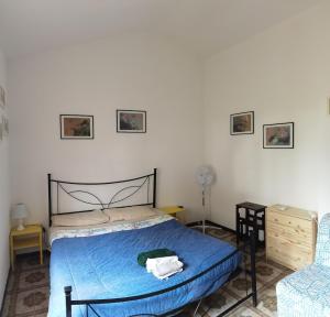 Posteľ alebo postele v izbe v ubytovaní Casa Giannella, a due passi dal mare + 2 fotografie