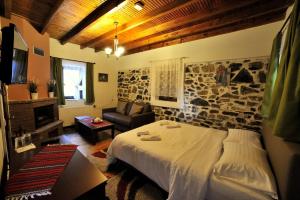Posteľ alebo postele v izbe v ubytovaní Guesthouse Papastoikou