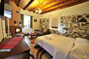Posteľ alebo postele v izbe v ubytovaní Guesthouse Papastoikou