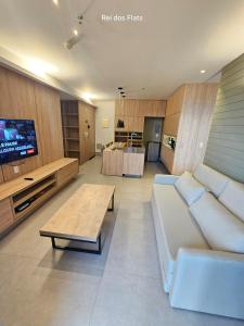 TV a/nebo společenská místnost v ubytování Blend Apartments Águas Claras By Rei dos Flats