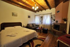 Posteľ alebo postele v izbe v ubytovaní Guesthouse Papastoikou