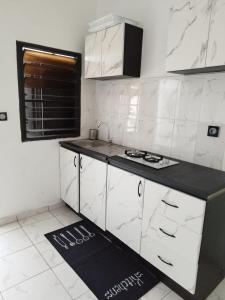 Kuchyň nebo kuchyňský kout v ubytování Résidence les Bermudes Appartement 1 er Étage