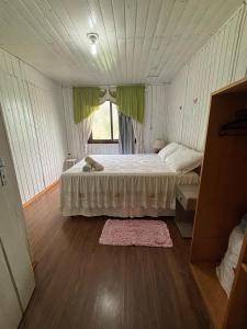 Ένα ή περισσότερα κρεβάτια σε δωμάτιο στο Casa Hospedes