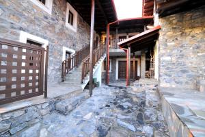 Fotografia z galérie ubytovania Guesthouse Papastoikou v destinácii Palaios Agios Athanasios