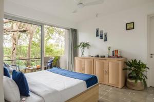 Ένα ή περισσότερα κρεβάτια σε δωμάτιο στο 3BHK Luxury Villa in North Goa Verem