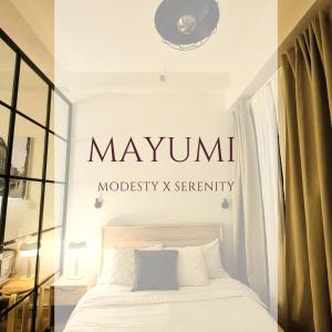 Katil atau katil-katil dalam bilik di Mayumi Staycation on SMDC Trees Residences