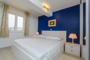 Postel nebo postele na pokoji v ubytování Luxury Apartment Kalebic