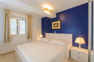 Postel nebo postele na pokoji v ubytování Luxury Apartment Kalebic