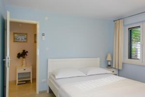 Postel nebo postele na pokoji v ubytování Luxury Apartment Kalebic