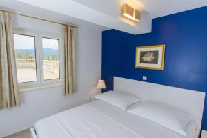 Postel nebo postele na pokoji v ubytování Luxury Apartment Kalebic