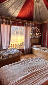 Postel nebo postele na pokoji v ubytování RUM GOLDEN DUNE lUXURY RESORT