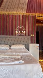 Postel nebo postele na pokoji v ubytování RUM GOLDEN DUNE lUXURY RESORT