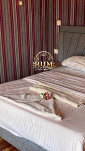 Postel nebo postele na pokoji v ubytování RUM GOLDEN DUNE lUXURY RESORT