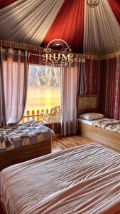 Postel nebo postele na pokoji v ubytování RUM GOLDEN DUNE lUXURY RESORT