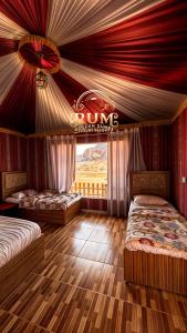 Postel nebo postele na pokoji v ubytování RUM GOLDEN DUNE lUXURY RESORT