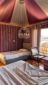 Postel nebo postele na pokoji v ubytování RUM GOLDEN DUNE lUXURY RESORT