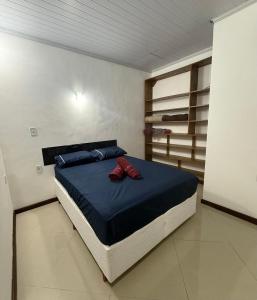 Giường trong phòng chung tại Casa Duplex, Marinas