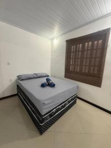 Giường trong phòng chung tại Casa Duplex, Marinas