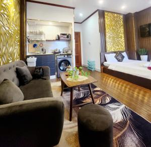Kuchyň nebo kuchyňský kout v ubytování HA Hotel & Apartment