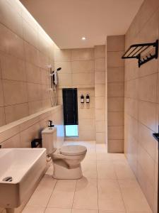 Koupelna v ubytování Roxy Hotel Malihah