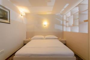 Postel nebo postele na pokoji v ubytování Luxury Apartment Kalebic