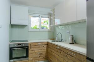 Kuchyň nebo kuchyňský kout v ubytování Luxury Apartment Kalebic