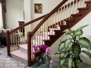 Φωτογραφία από το άλμπουμ του Master Bedroom with Two Queen Sized Bed σε Ρίτσμοντ